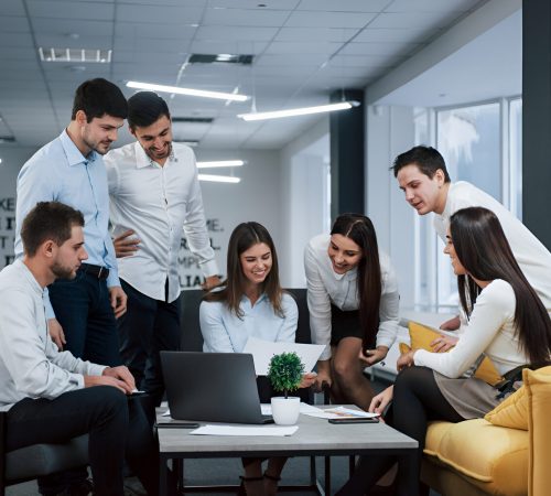 into-success-group-young-freelancers-office-have-conversation-smiling-scaled-1-1536x1025-Picsart-AiImageEnhancer